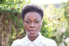 Portrait photograph of Joan Iyiola, by Lucy Barriball