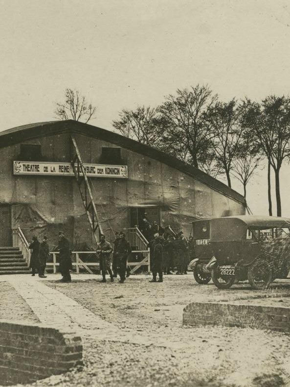 A sepia image of soldiers outside Theatre de la Reine.