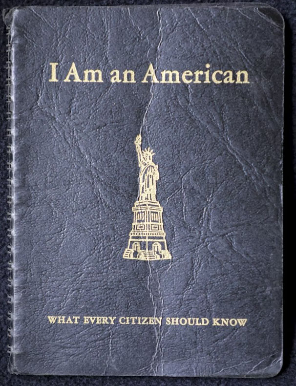 A photograph of a copy of the book, I Am An American: What Every Citizen Should Know